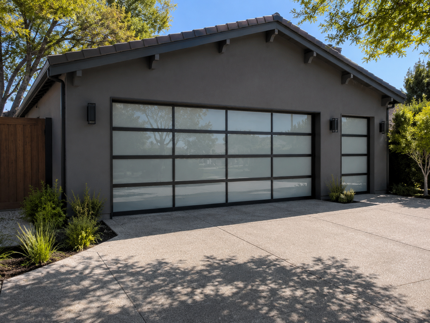 Architectural full view glass garage door on a contemporary custom home in Greenbrook Danville